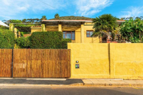 Sun, Sea & a Wood-Fired Hot Tub in a Downtown Mediterranean Villa